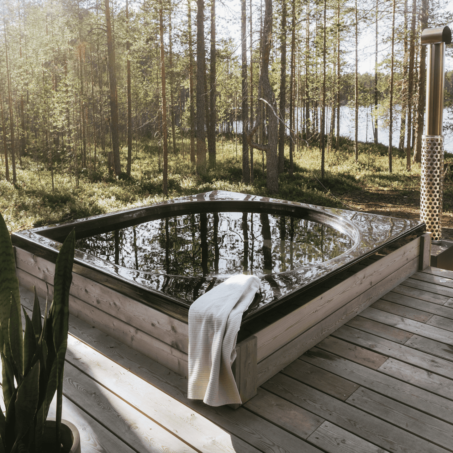 drop design spa in black in a forest