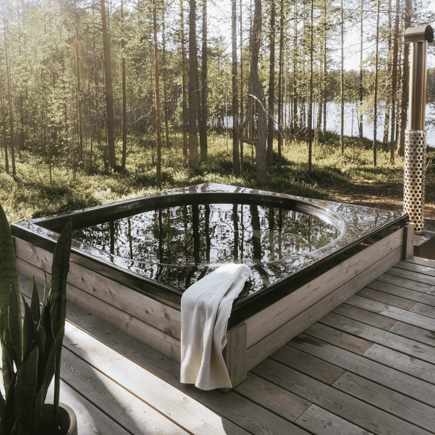 drop design spa in black in a forest